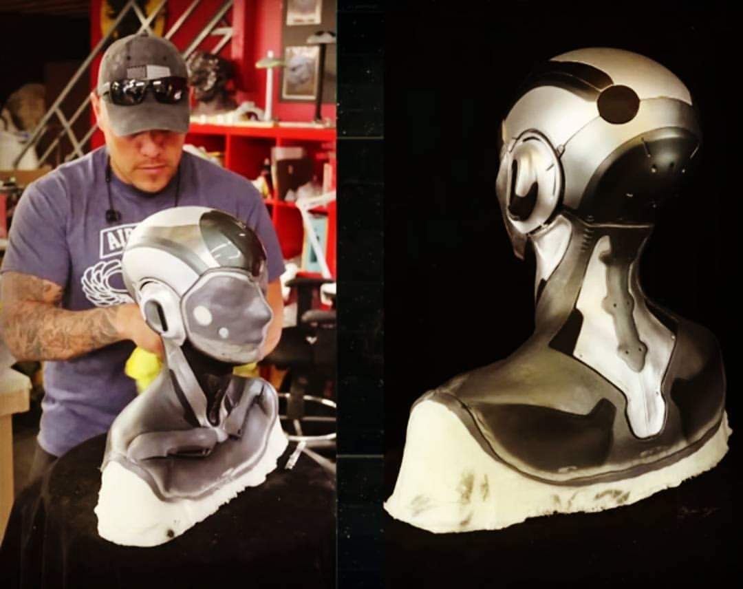 Two tactical helmets showing different paint finishes for camera